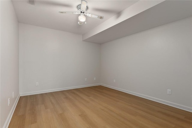 11311 E Thistlewood Ln, Effingham, IL 62401 - unfurnished room featuring wood finished floors and a ceiling fan