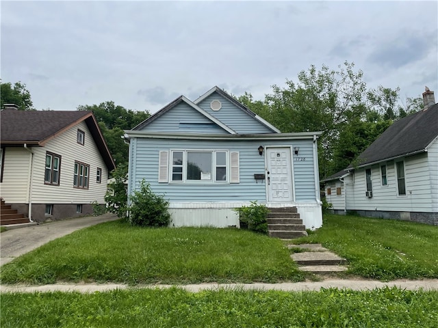 view of front of house with a front yard