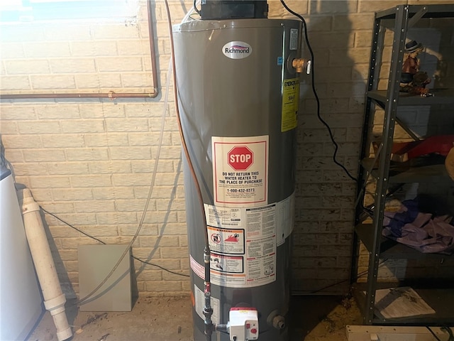 utility room with water heater