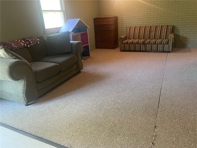 living room with brick wall