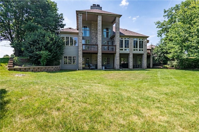 1250 W Hickory Point Rd, Decatur, IL 62526 - back of house with a yard, a deck, and a chimney