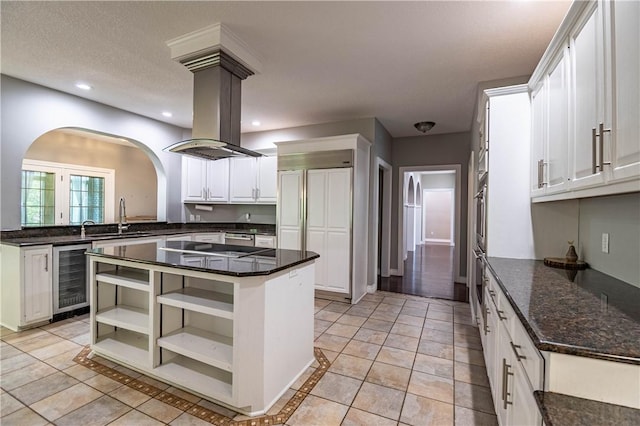 1250 W Hickory Point Rd, Decatur, IL 62526 - kitchen featuring beverage cooler, open shelves, white cabinetry, paneled built in refrigerator, and light tile patterned flooring