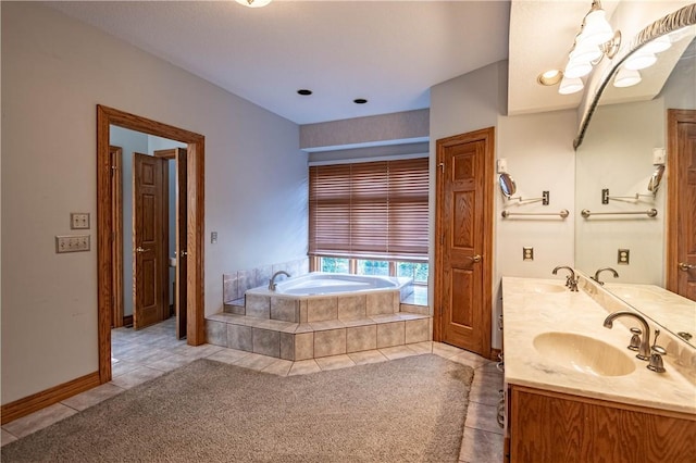 1250 W Hickory Point Rd, Decatur, IL 62526 - full bathroom with double vanity, a garden tub, and tile patterned floors