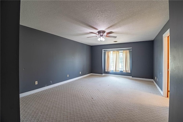 1250 W Hickory Point Rd, Decatur, IL 62526 - spare room with ceiling fan, light carpet, and a textured ceiling