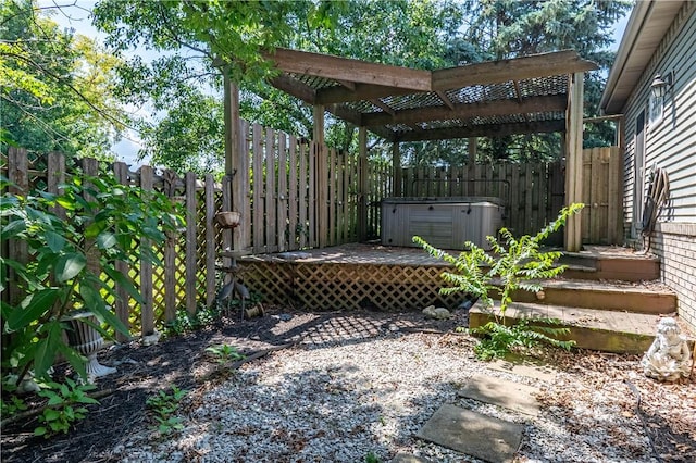 1250 W Hickory Point Rd, Decatur, IL 62526 - fenced backyard featuring a hot tub, a wooden deck, and a pergola