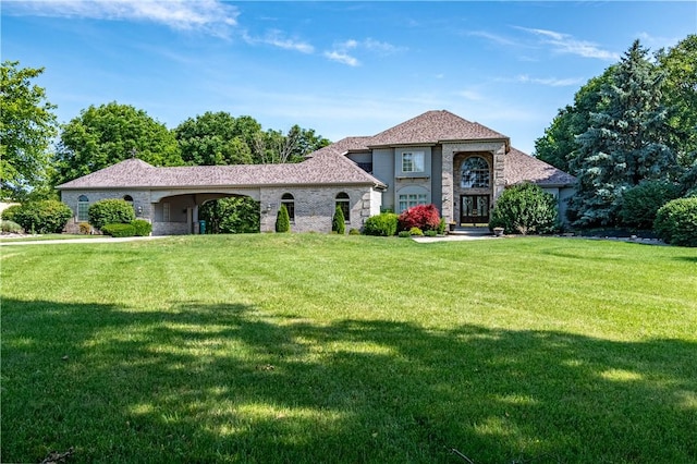 1250 W Hickory Point Rd, Decatur, IL 62526 - view of front of property featuring a front lawn and french doors