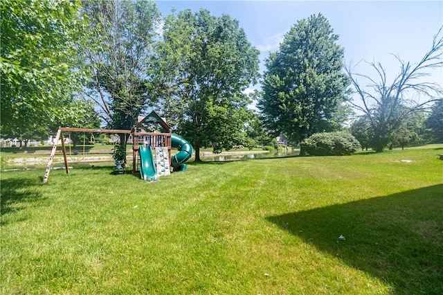 1250 W Hickory Point Rd, Decatur, IL 62526 - view of grassy yard featuring a playground