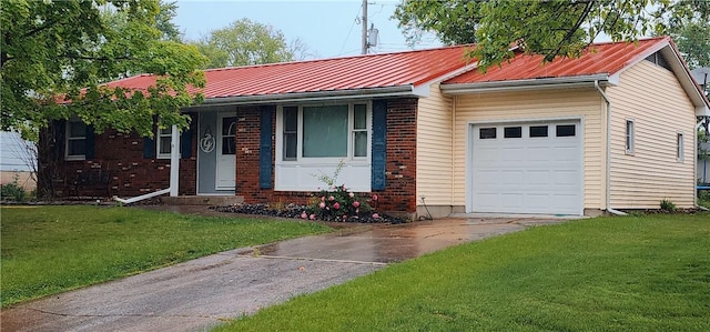 22 S Lakewood Dr, Effingham, IL 62401 - ranch-style home featuring a front lawn, driveway, an attached garage, metal roof, and brick siding