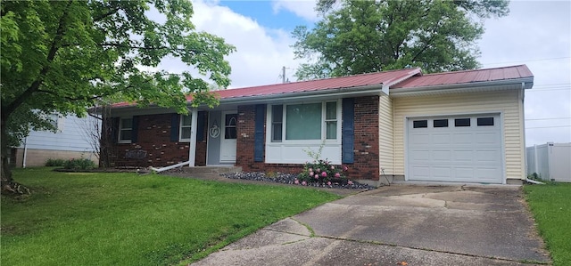 22 S Lakewood Dr, Effingham, IL 62401 - ranch-style home with a front yard, an attached garage, and brick siding