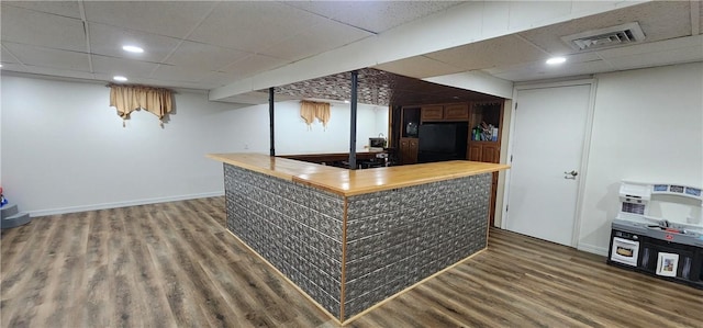 22 S Lakewood Dr, Effingham, IL 62401 - bar featuring black fridge, a paneled ceiling, wood finished floors, baseboards, and recessed lighting