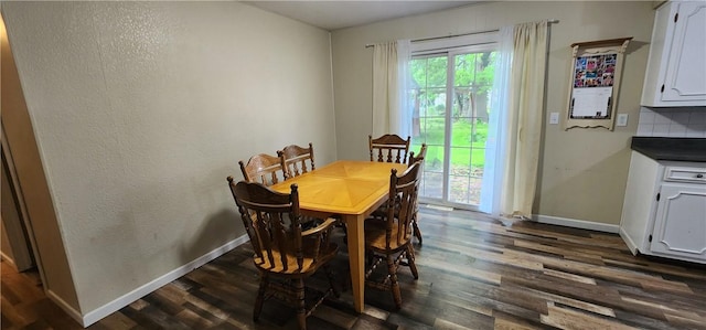 22 S Lakewood Dr, Effingham, IL 62401 - dining room featuring dark wood-style flooring and baseboards