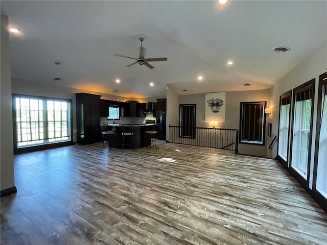 104 Woodland Dr, Marshall, IL 62441 - unfurnished living room featuring ceiling fan and hardwood / wood-style flooring