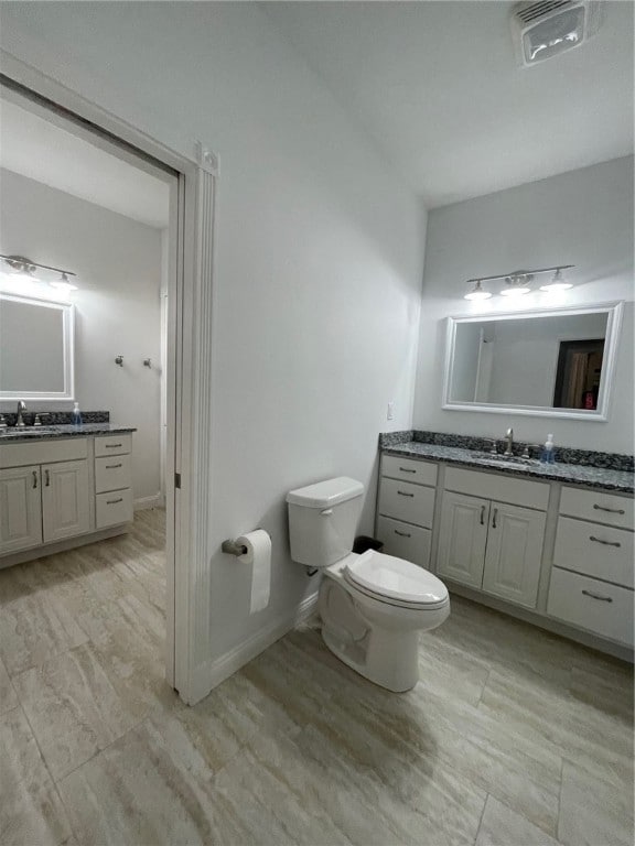 104 Woodland Dr, Marshall, IL 62441 - bathroom featuring vanity and toilet