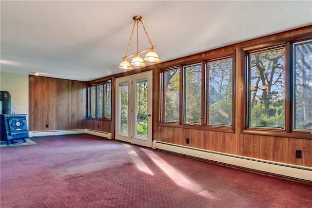 27 Heather Dr, Charleston, IL 61920 - unfurnished sunroom with baseboard heating and a wood stove