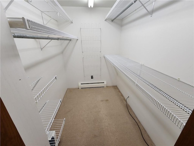 2638 E 1050th Ave, Oblong, IL 62449 - spacious closet with a baseboard heating unit and carpet floors