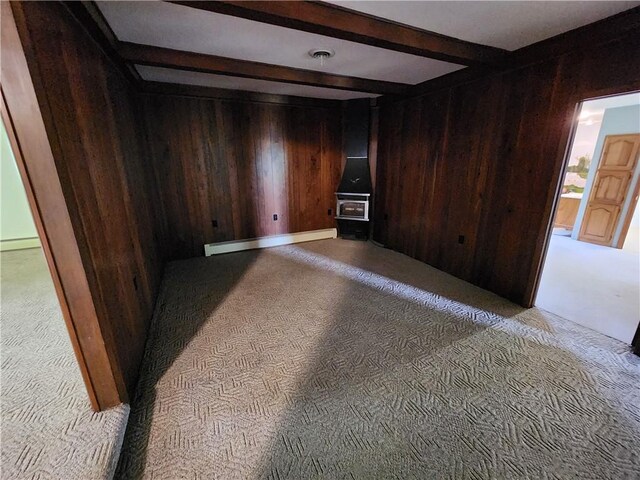 2638 E 1050th Ave, Oblong, IL 62449 - carpeted empty room featuring wooden walls and beamed ceiling