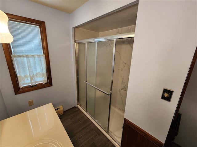 2638 E 1050th Ave, Oblong, IL 62449 - full bath featuring a stall shower, wood finished floors, and baseboard heating
