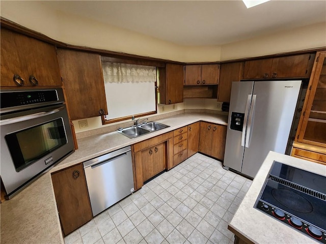 2638 E 1050th Ave, Oblong, IL 62449 - kitchen with appliances with stainless steel finishes, a sink, and light countertops