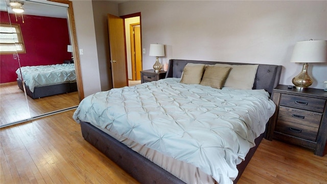 bedroom featuring wood finished floors