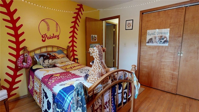 bedroom with wood finished floors