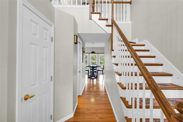 715 W Coolidge Ave, Charleston, IL 61920 - stairway with wood finished floors and a high ceiling
