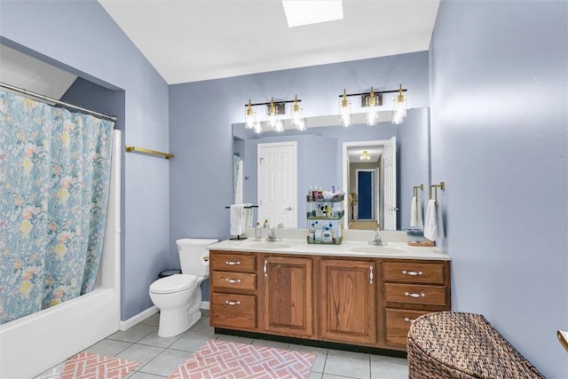715 W Coolidge Ave, Charleston, IL 61920 - full bath featuring tile patterned flooring, double vanity, shower / tub combo, and a skylight
