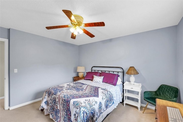 715 W Coolidge Ave, Charleston, IL 61920 - carpeted bedroom featuring baseboards and a ceiling fan