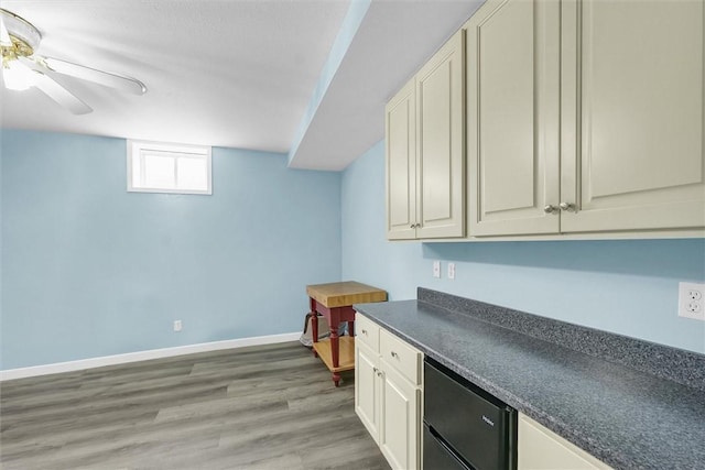 715 W Coolidge Ave, Charleston, IL 61920 - bar area featuring baseboards and light wood-type flooring