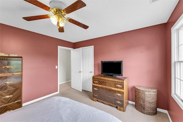 715 W Coolidge Ave, Charleston, IL 61920 - carpeted bedroom featuring baseboards and ceiling fan