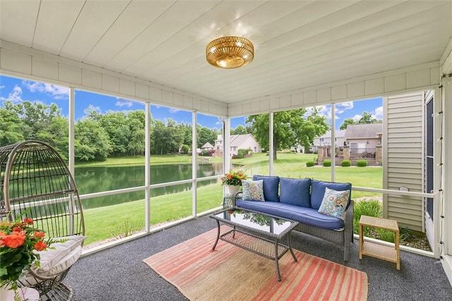 715 W Coolidge Ave, Charleston, IL 61920 - sunroom with a water view, an outdoor hangout area, and healthy amount of natural light