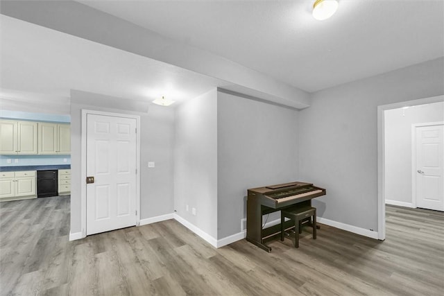 715 W Coolidge Ave, Charleston, IL 61920 - empty room with light wood-type flooring