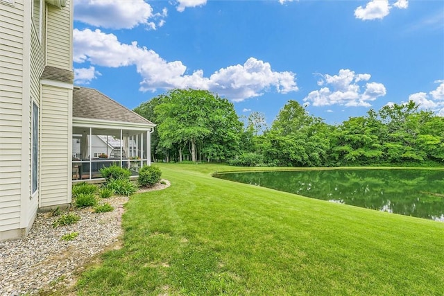 715 W Coolidge Ave, Charleston, IL 61920 - view of green lawn featuring a water view and a sunroom