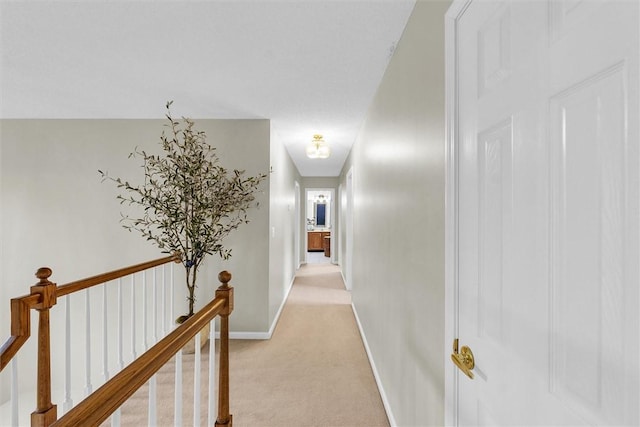 715 W Coolidge Ave, Charleston, IL 61920 - hall featuring light colored carpet and baseboards