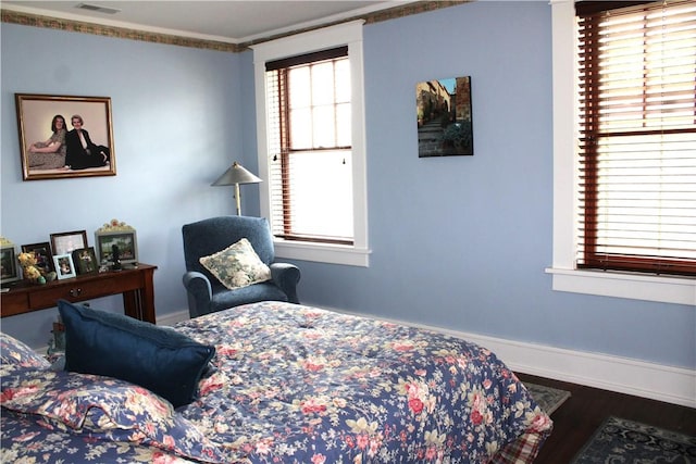 300 W N 1st St, Shelbyville, IL 62565 - bedroom featuring wood finished floors, baseboards, and crown molding