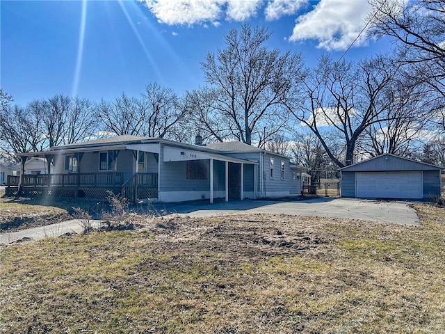 559 N Excelsior Rd, Decatur, IL 62521 - view of front facade with covered porch, an outdoor structure, and a garage