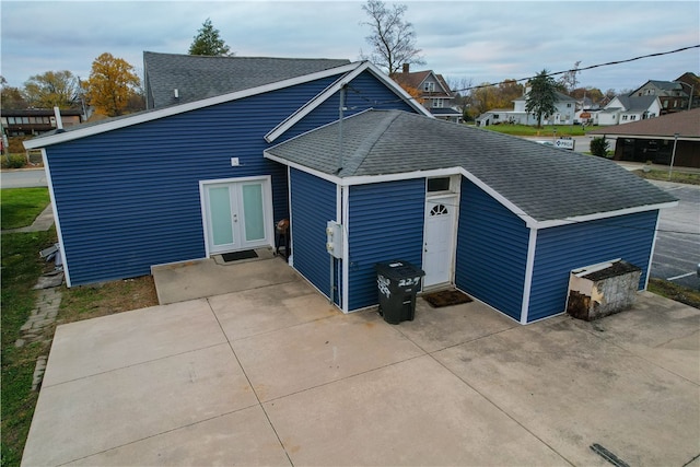 rear view of house featuring french doors and a patio