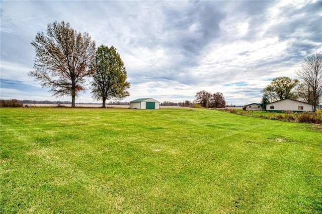 18004 N 2180th St, Marshall, IL 62441 - view of grassy yard featuring an outbuilding, a pole building, and a view of countryside