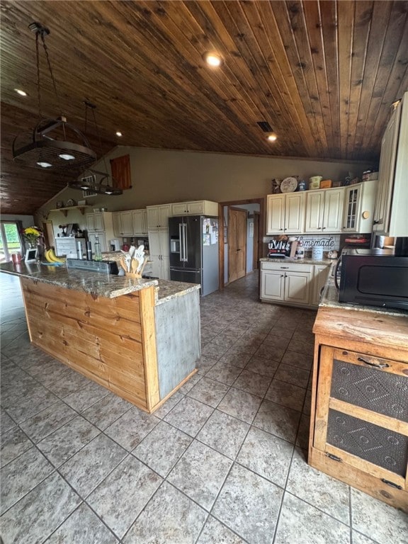 6414 300th Rd, Martinsville, IL 62442 - kitchen with black appliances, lofted ceiling, cream cabinetry, wood ceiling, and tile patterned floors