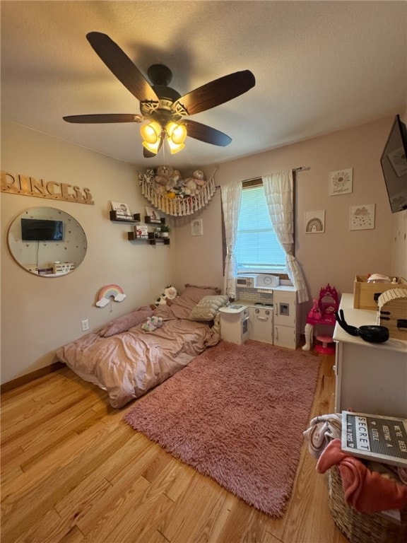6414 300th Rd, Martinsville, IL 62442 - bedroom featuring light wood finished floors and a ceiling fan