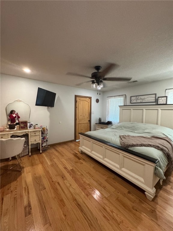 6414 300th Rd, Martinsville, IL 62442 - bedroom with light wood-style floors and a ceiling fan