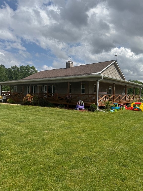 6414 300th Rd, Martinsville, IL 62442 - rear view of property with a yard and a chimney