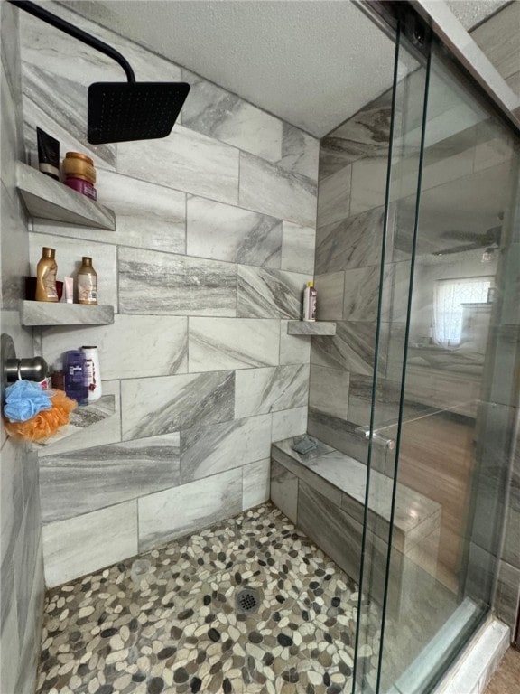 6414 300th Rd, Martinsville, IL 62442 - bathroom featuring a stall shower and a textured ceiling