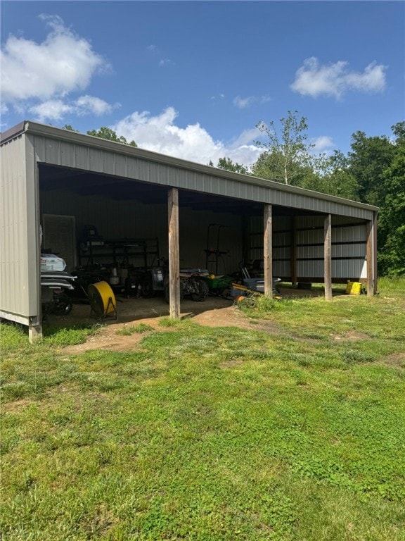 6414 300th Rd, Martinsville, IL 62442 - view of pole building with a lawn and a carport