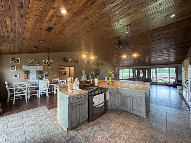 6414 300th Rd, Martinsville, IL 62442 - kitchen with double oven range, gray cabinets, wood ceiling, vaulted ceiling, and pendant lighting