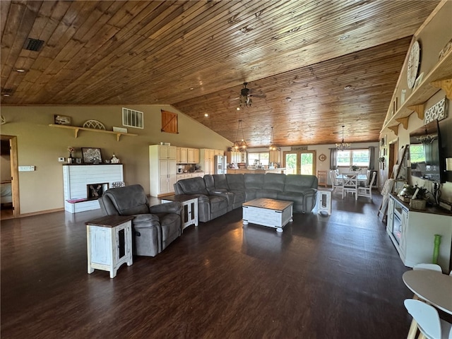 6414 300th Rd, Martinsville, IL 62442 - living room featuring wood ceiling, dark wood finished floors, a ceiling fan, a fireplace with raised hearth, and high vaulted ceiling