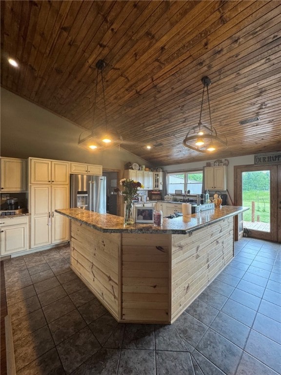 6414 300th Rd, Martinsville, IL 62442 - kitchen featuring stainless steel fridge, wood ceiling, a large island, vaulted ceiling, and stone counters