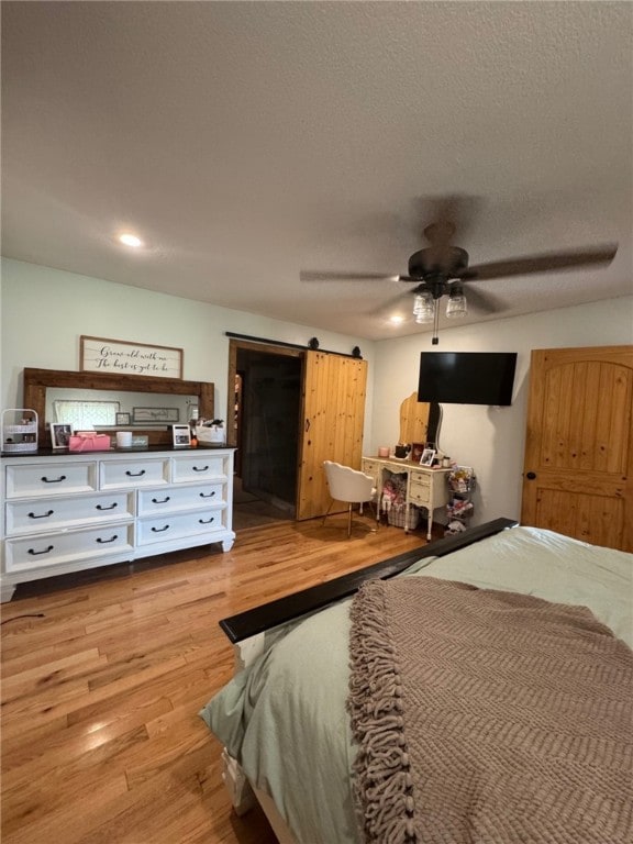 6414 300th Rd, Martinsville, IL 62442 - bedroom with wood finished floors, a ceiling fan, and recessed lighting