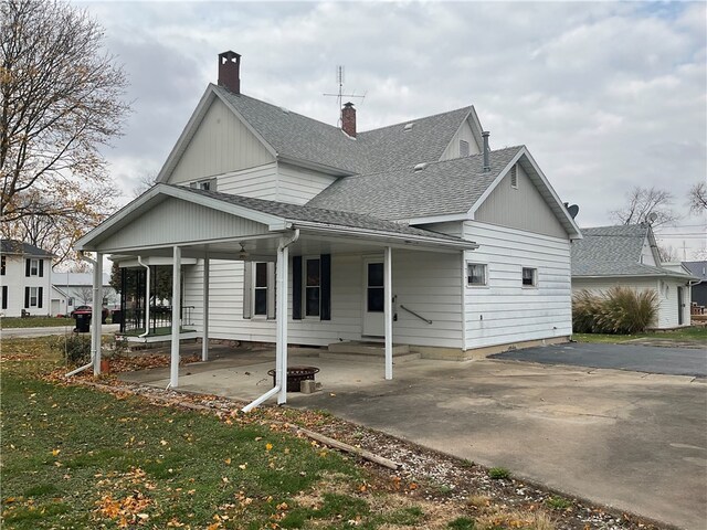 exterior space featuring a porch and a patio