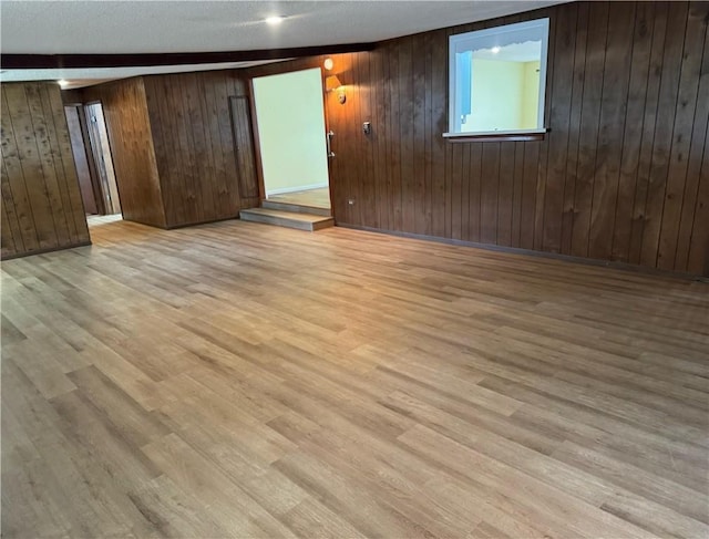 824 Kenton Dr, Charleston, IL 61920 - spare room with wood finished floors and wood walls