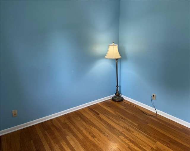 824 Kenton Dr, Charleston, IL 61920 - spare room with baseboards and wood finished floors